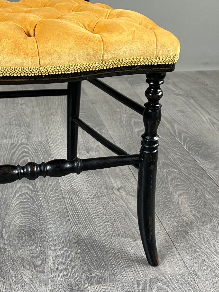 Set of four Napoleon III chairs in blackened wood, 19th century.
