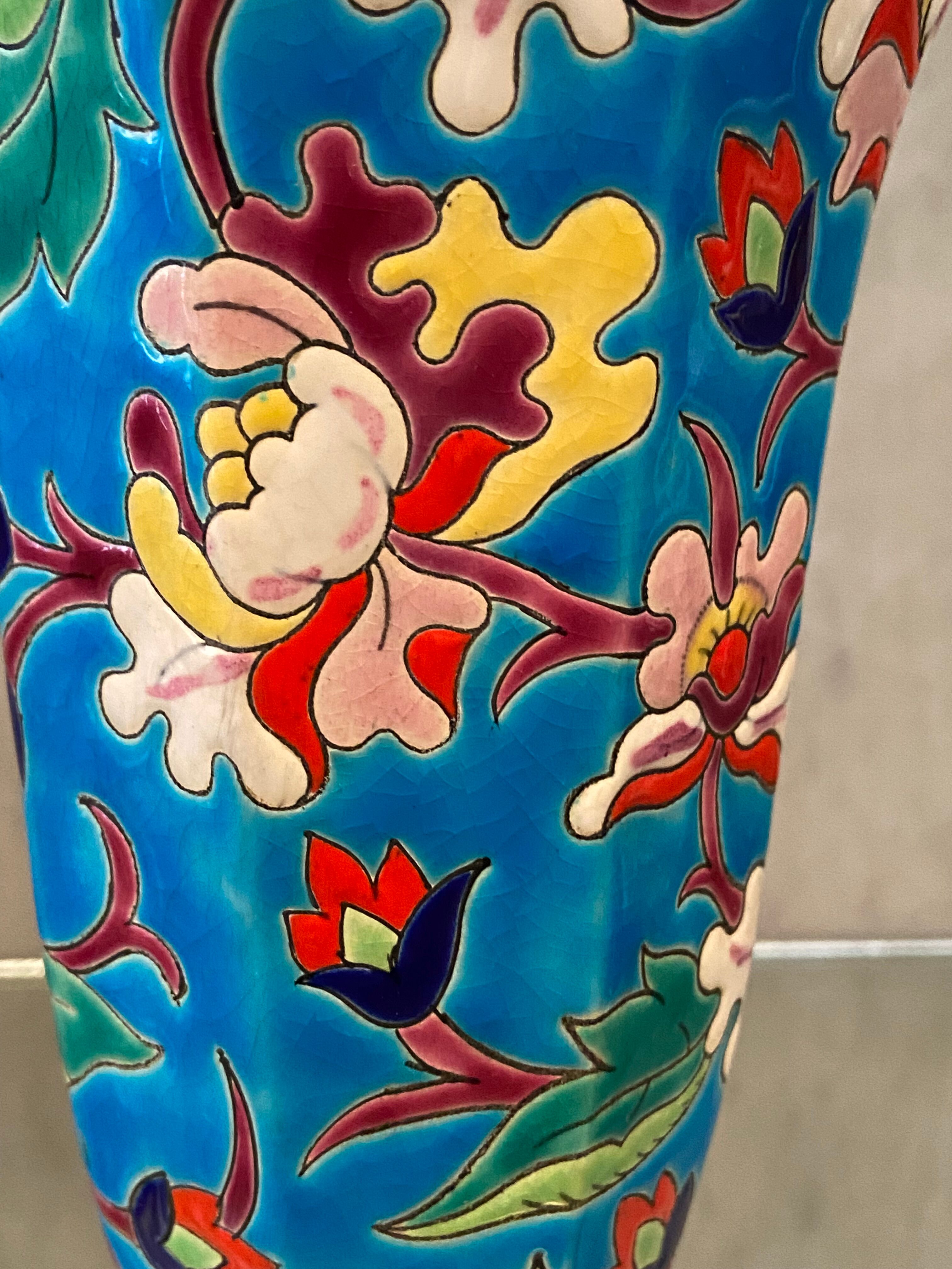 Faience cornet vase with floral decoration signed Emaux de Longwy