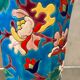 Faience cornet vase with floral decoration signed Emaux de Longwy