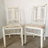 Set of 6 mismatched white chairs