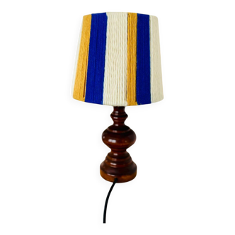 Vintage lamp with turned wooden base, striped wool lampshade