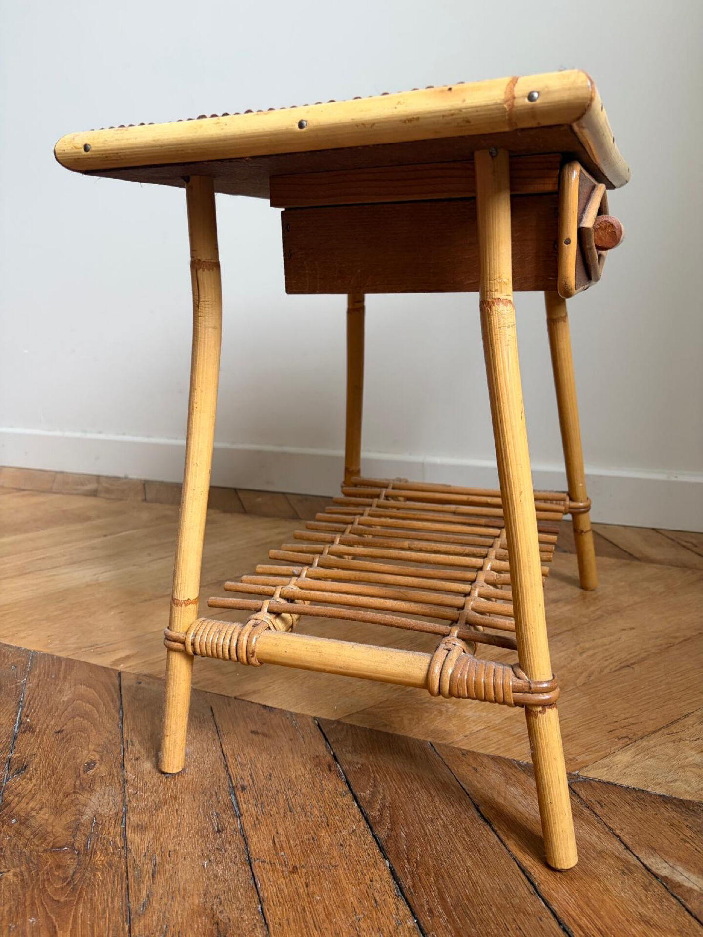 Rattan bedside tables in the style of Audoux Minet.