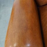 Set of 2  vintage cognac-colored sheep leather armchairs