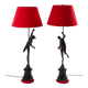 Pair of bronze lamps with red shades