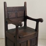 Fauteuil d’âtre formant coffre en chêne massif XVIIIème siècle