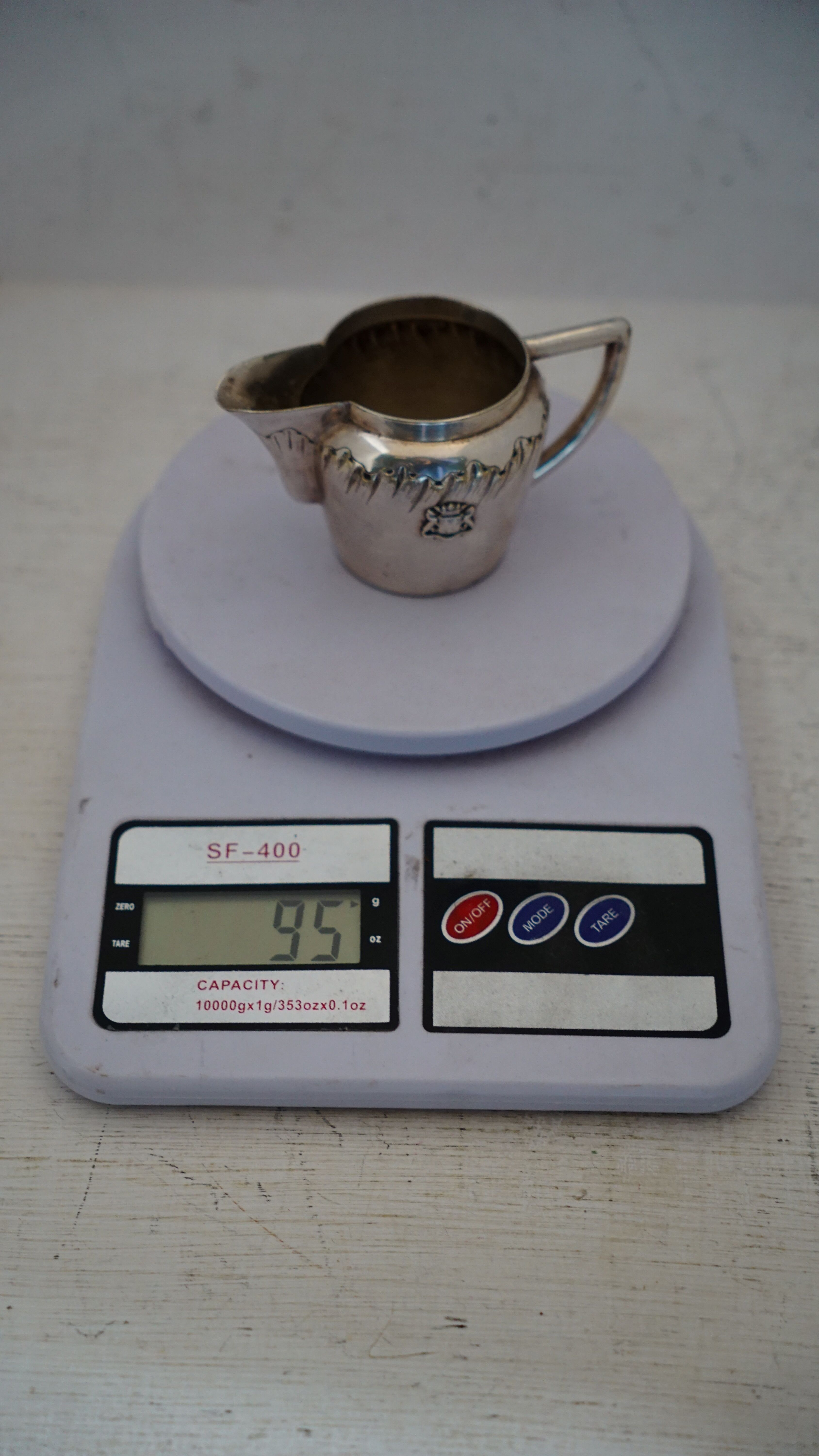 Teapot and milk jug English silverware