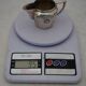 Teapot and milk jug English silverware