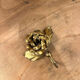 Pink-shaped hook in gilded metal