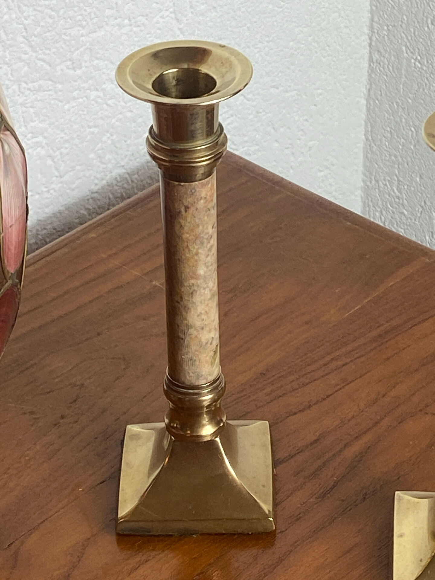 Pair of brass and stone candlesticks