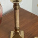 Pair of brass and stone candlesticks