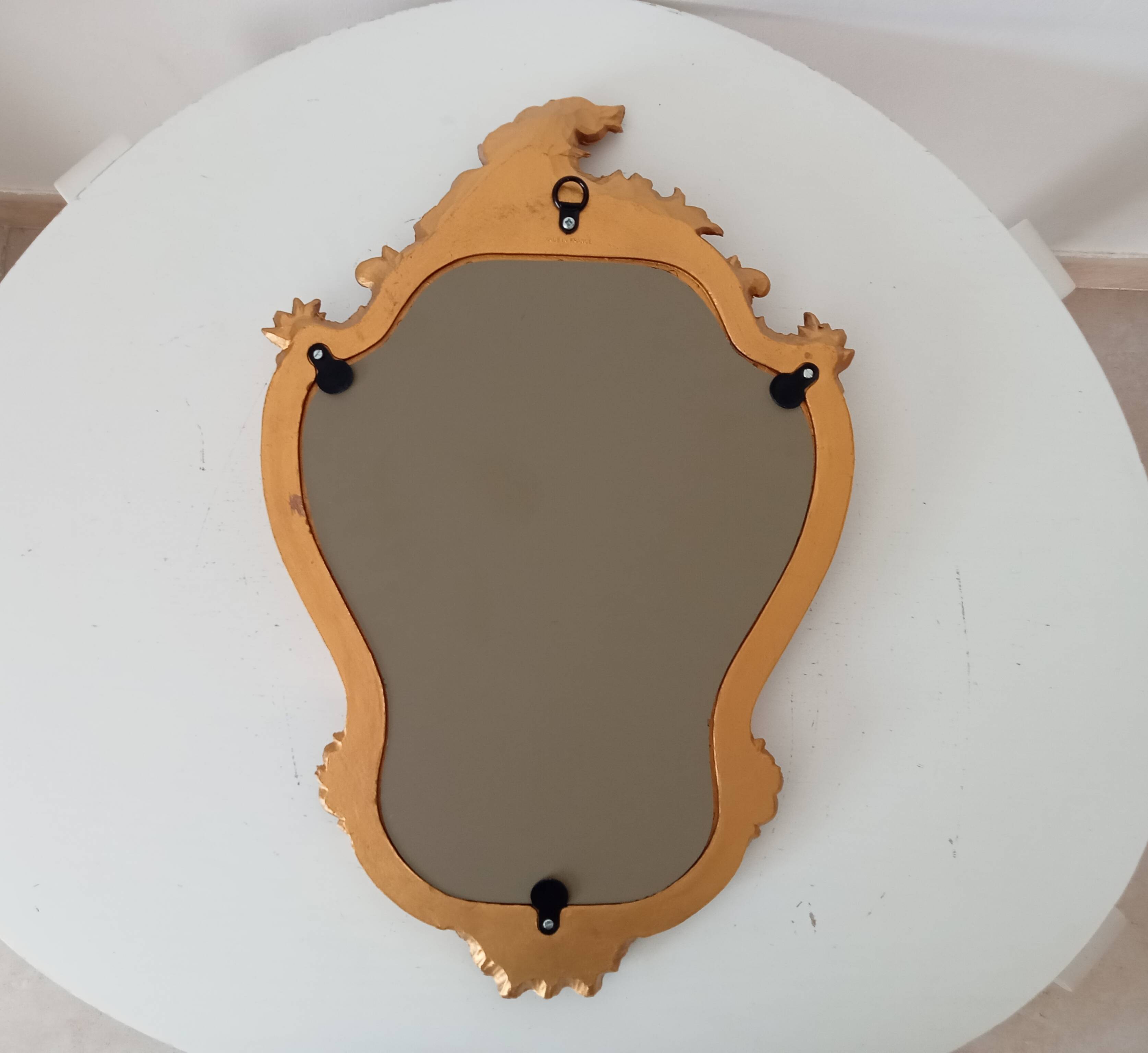 Vintage rococo mirror in gilded resin