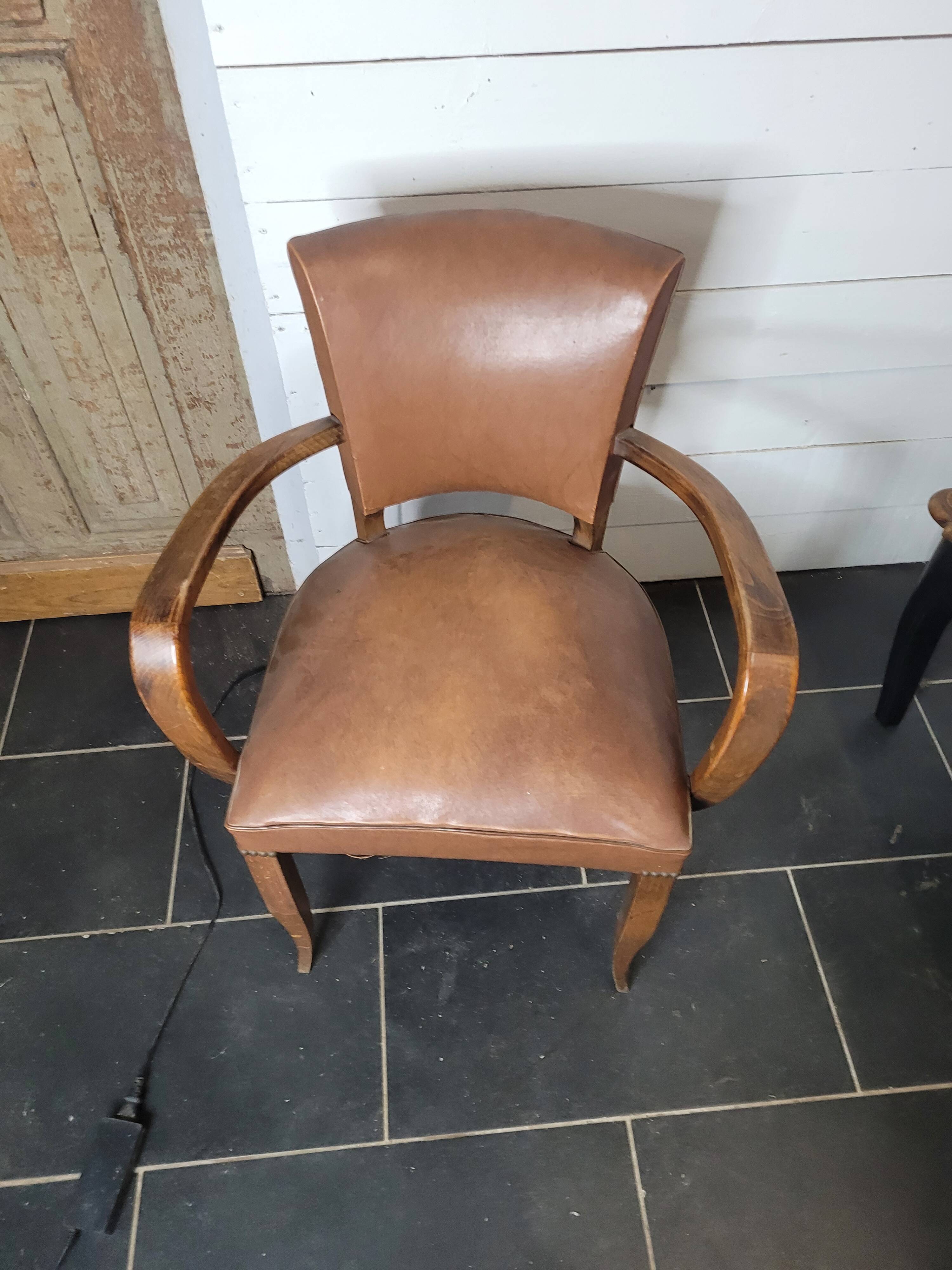 Bridge armchair in skai from the 60s