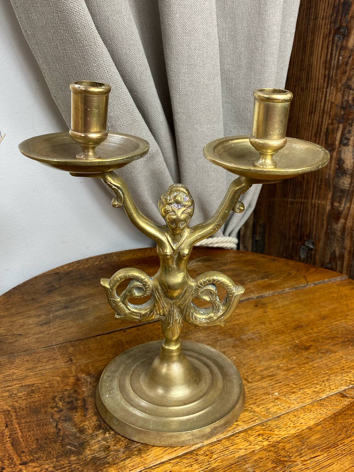 Mermaid-shaped chandelier in bronze