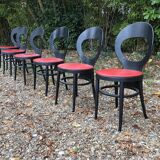 6 vintage Baumann seagull model chairs, black lacquered with red Skai seats.