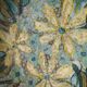 Hollow cut in blue enamelled sandstone decorated with yellow flowers