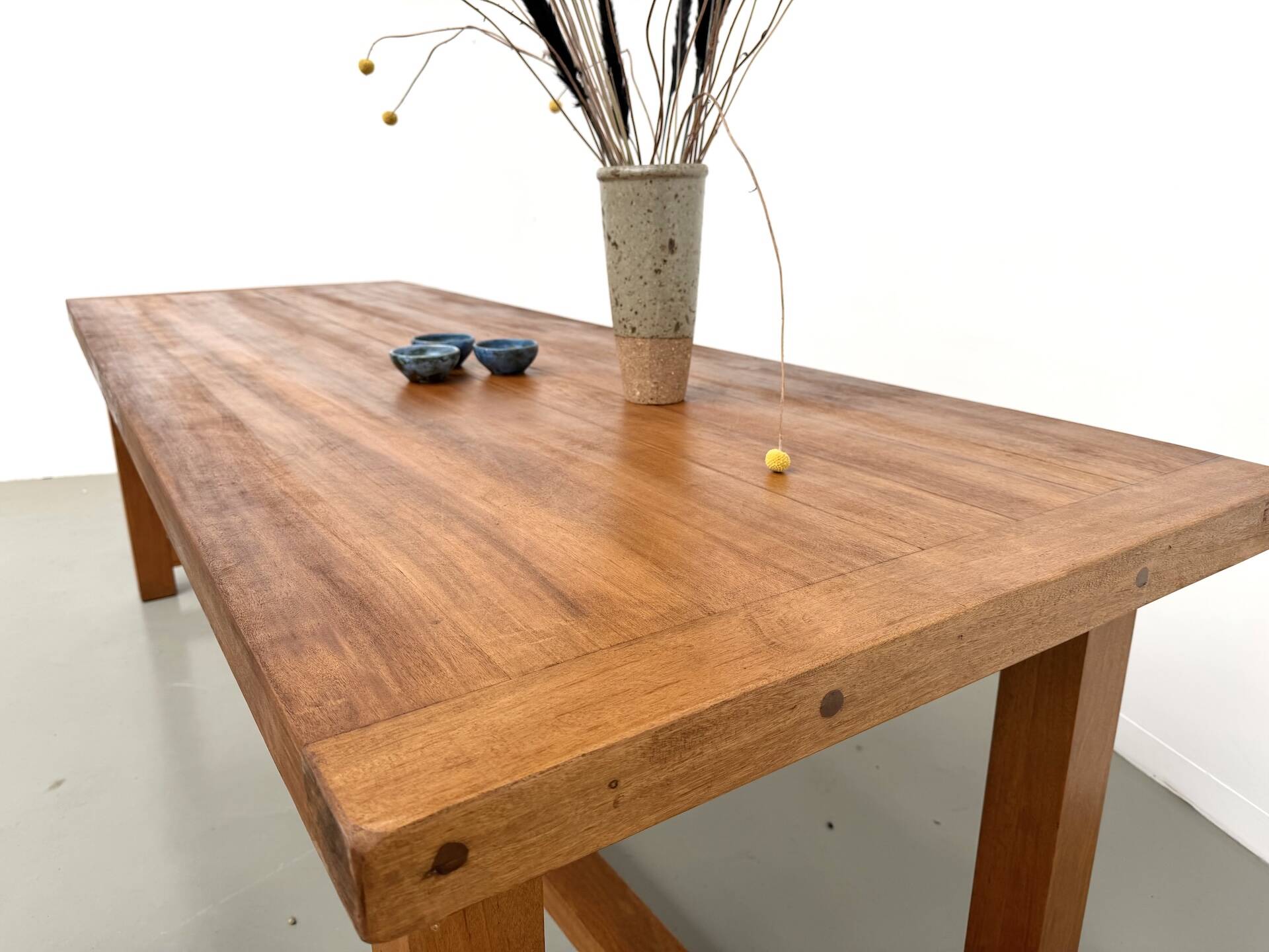 Large modernist farmhouse table in solid beech, thick dowelled top.