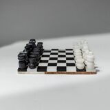 Vintage black-and-white marble chessboard with matching marble pieces, Italian 1960s design, sculptural centerpiece