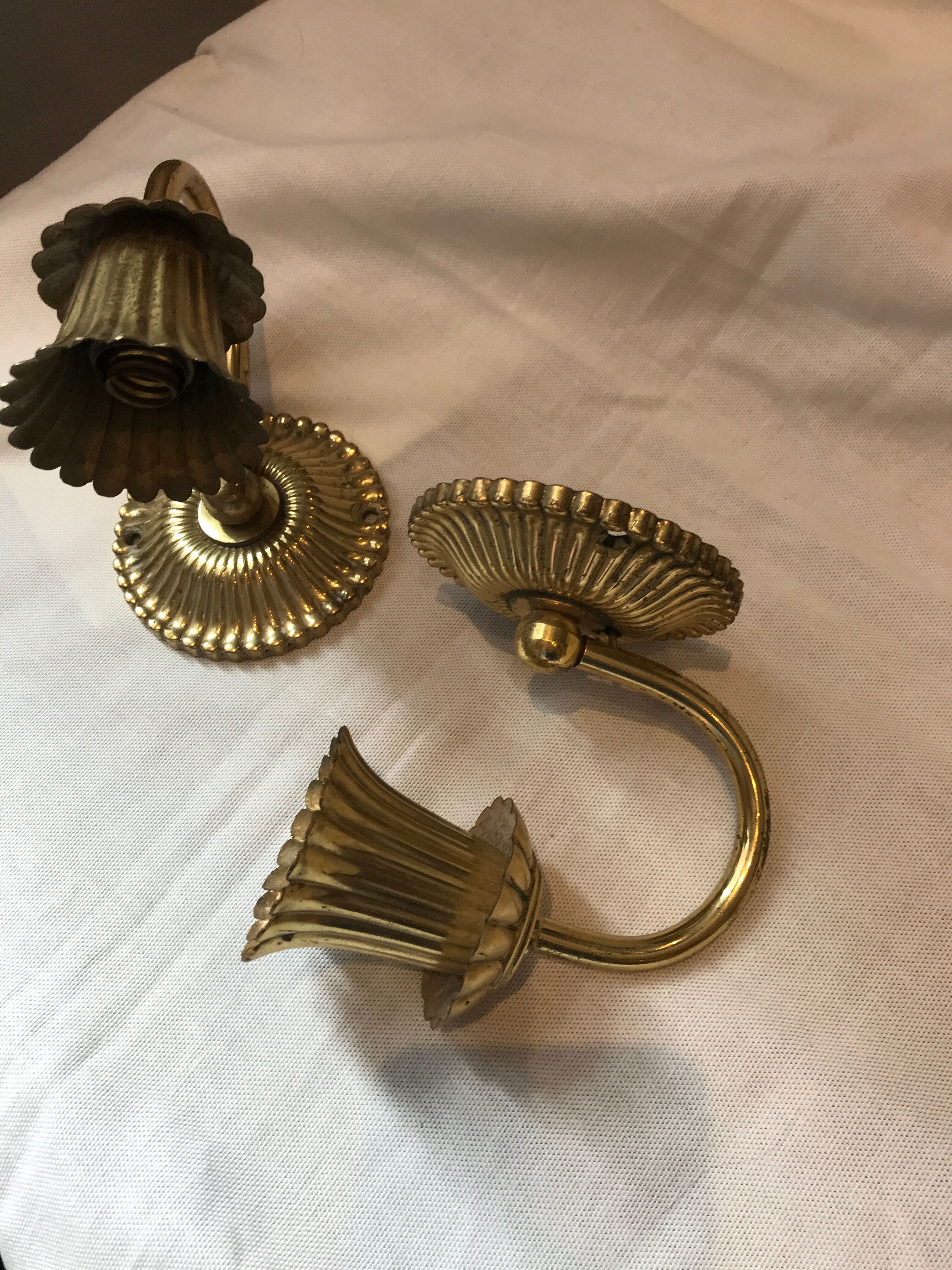 Pair of golden wall light