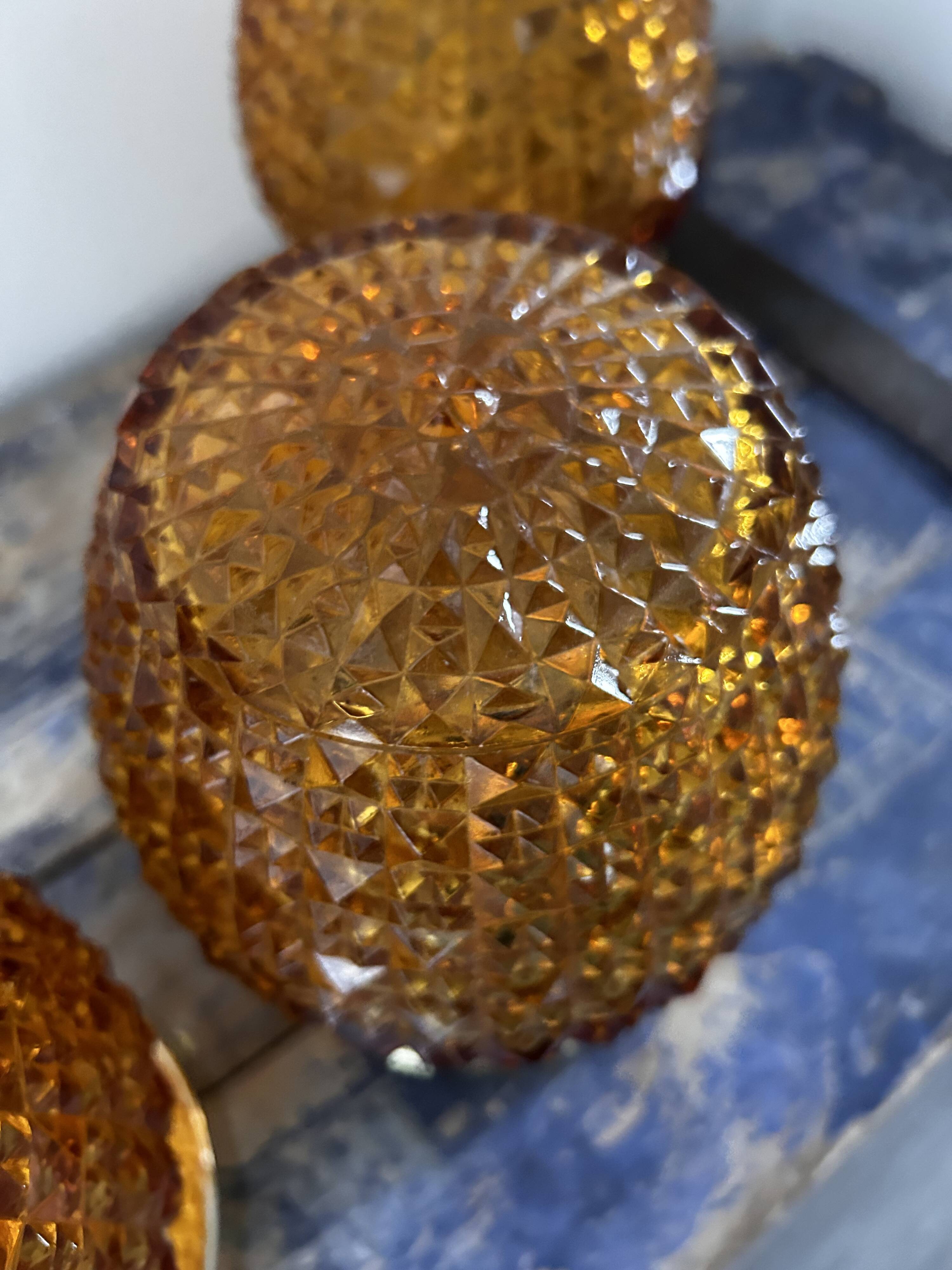 Set of three vintage wall or ceiling lights in amber chiseled glass