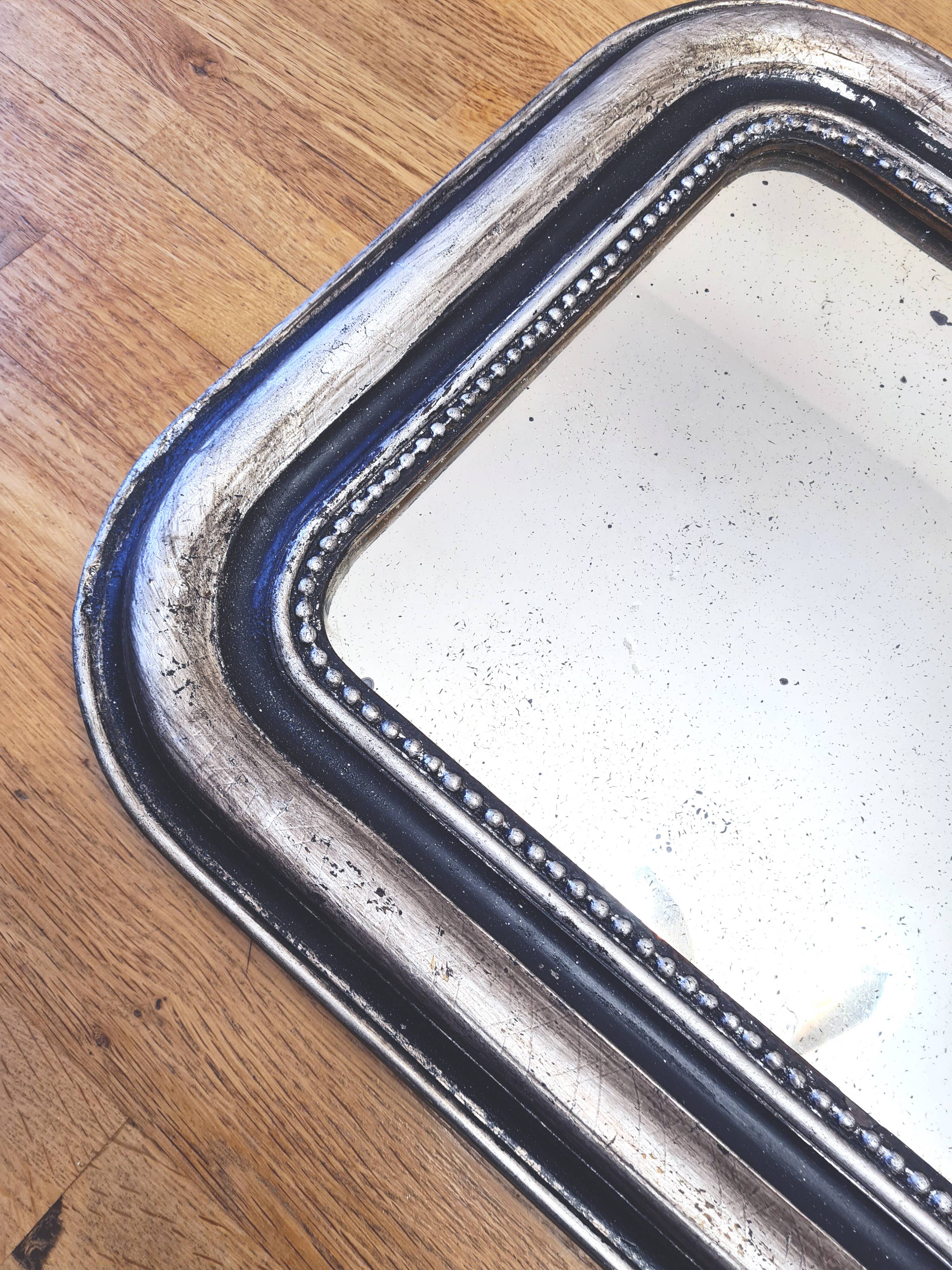 Old Louis Phillipe mirror, silvered with silver leaf.