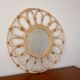Vintage rattan and bamboo sun mirror