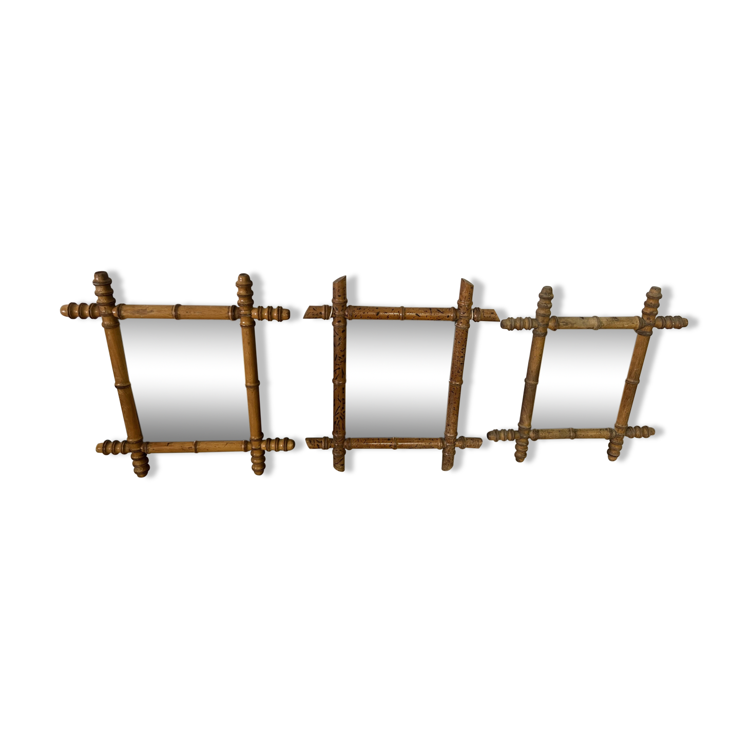 Suite of three antique mirrors in bamboo and rattan
