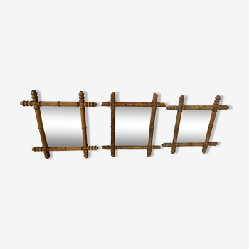 Suite de trois miroirs anciens en bambou et rotin