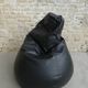 Pear armchair in imitation black leather