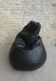 Pear armchair in imitation black leather