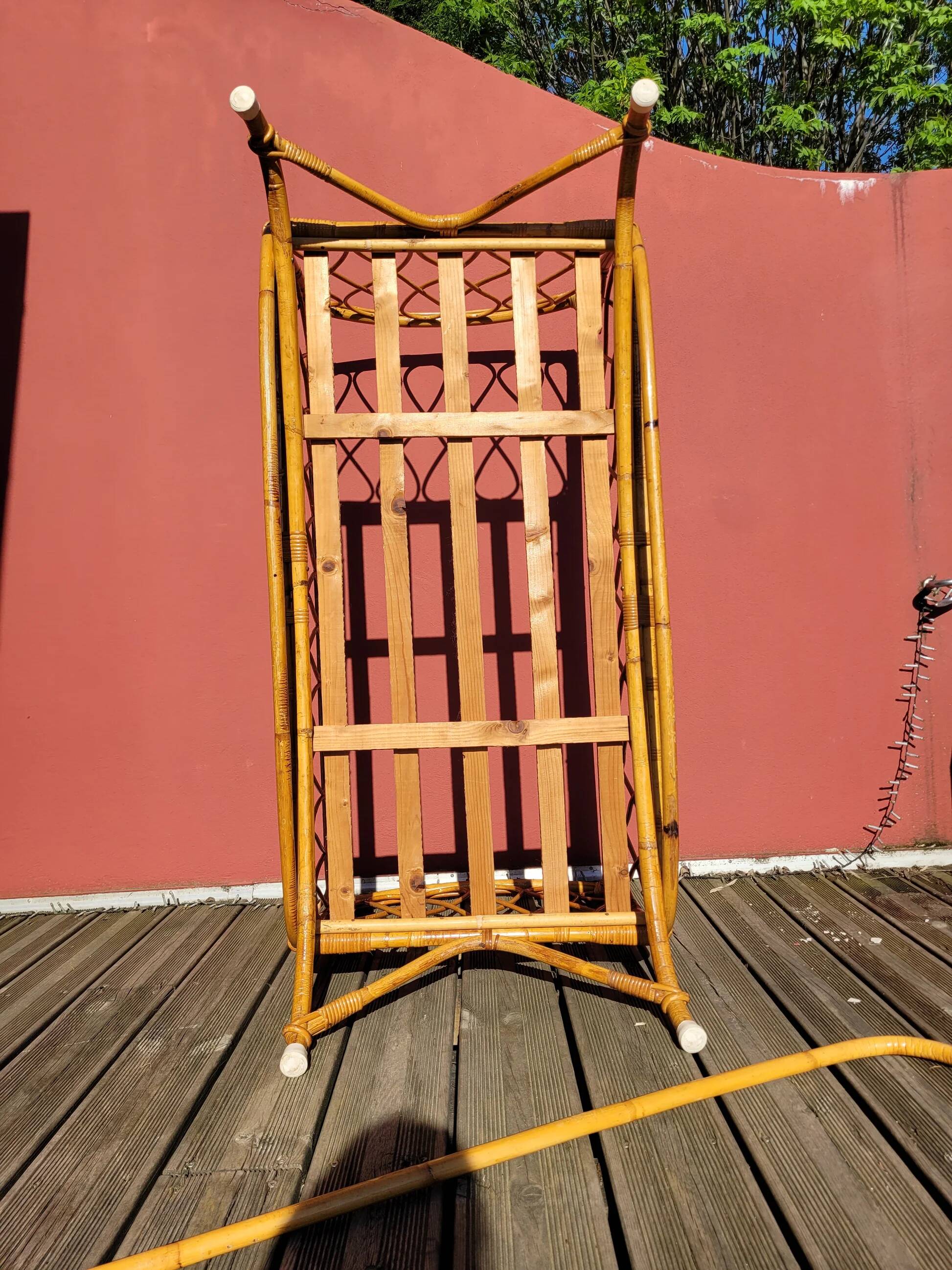 Bamboo and rattan baby cot with canopy.