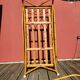 Bamboo and rattan baby cot with canopy.