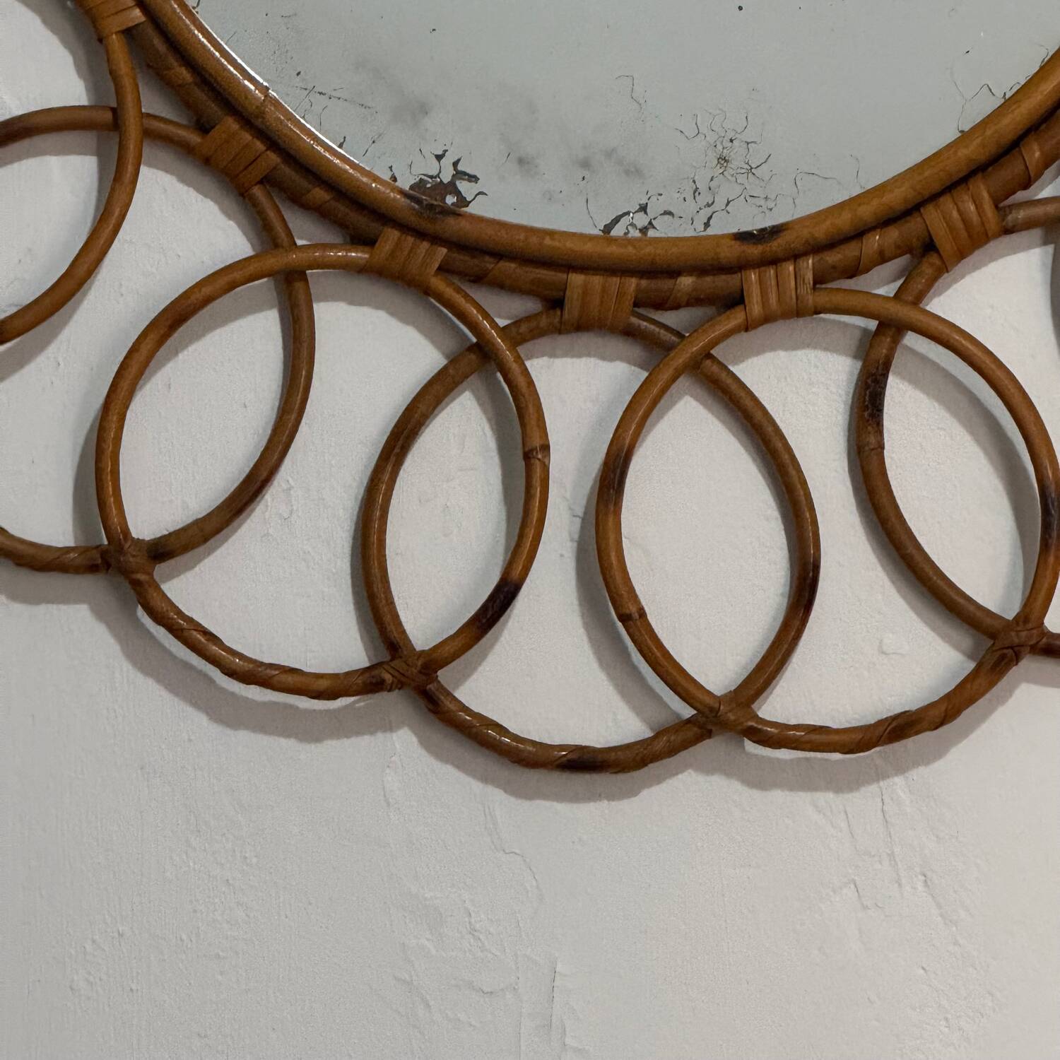 Round rattan mirror from the 1950s France