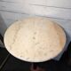 Bistro standing table with marble top and cast iron base.