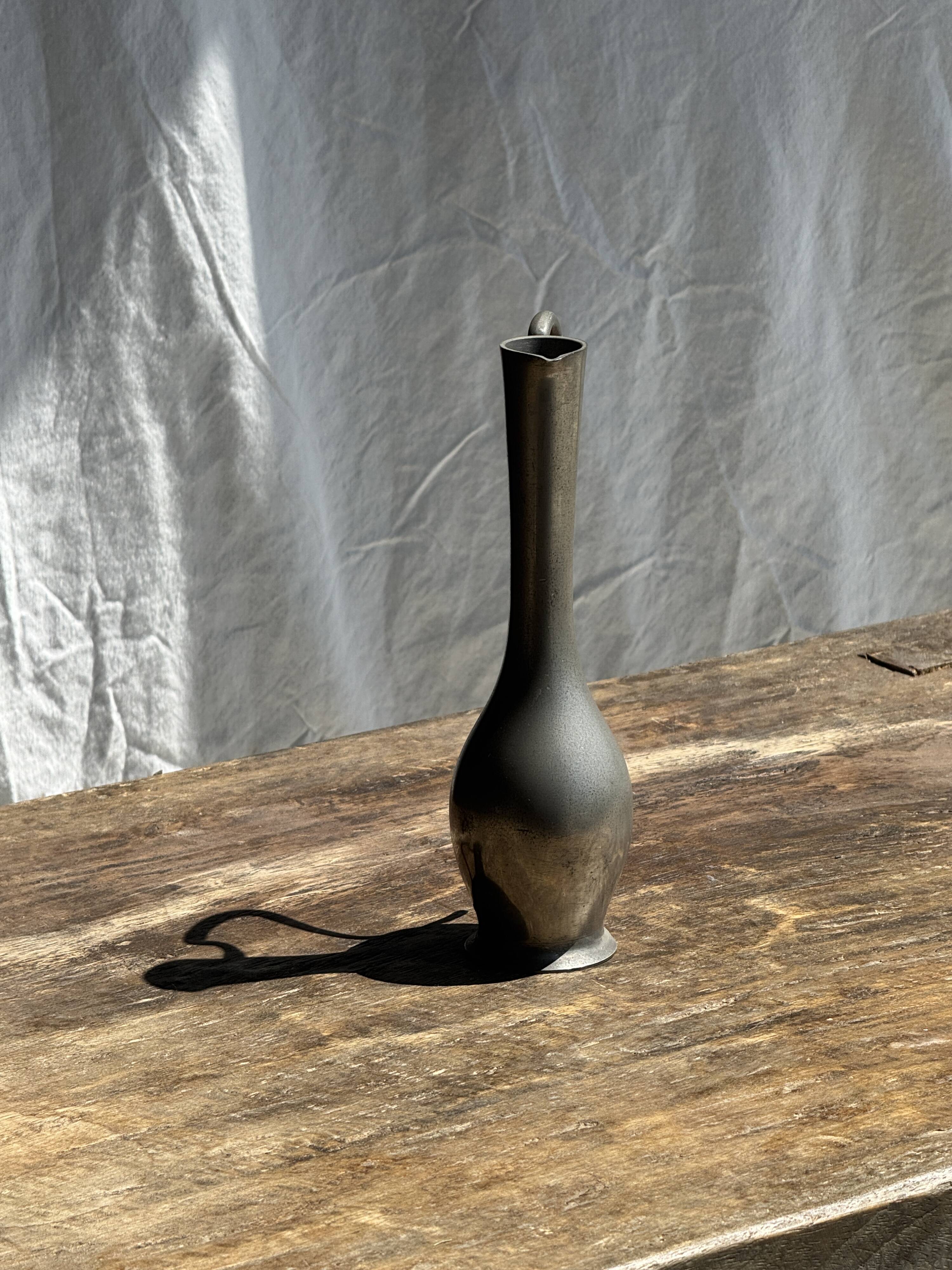 Small 19th century pewter jug, 95% hallmark H20.5