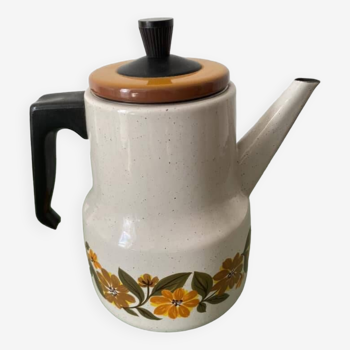 Vintage enameled coffee pot with flowers. Orange, brown, yellow and green colors.