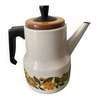 Vintage enameled coffee pot with flowers. Orange, brown, yellow and green colors.