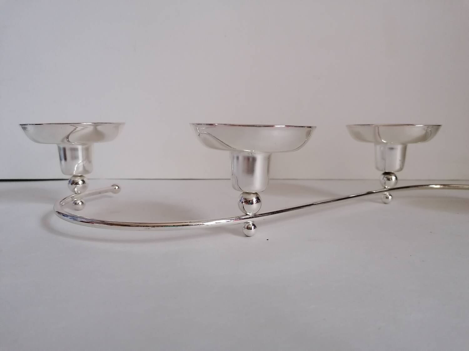 4-light silver metal candle holder