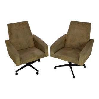 Pair of mid-century swivel armchairs with wheels 1970's