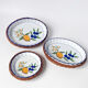Set of 3 vintage ceramic dishes with wicker baskets.