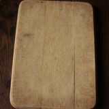 Wooden board to cut rounded edges