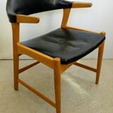 Danish armchair in oak and black leather