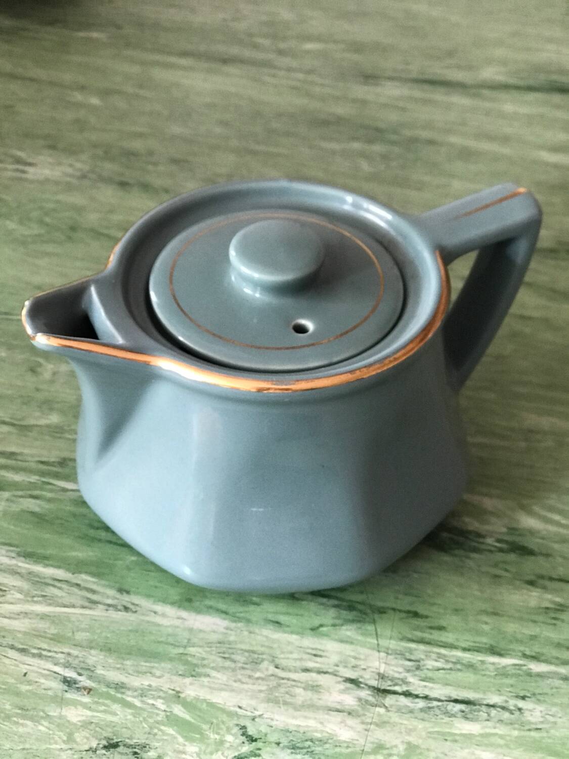 Antique celadon green teapot
