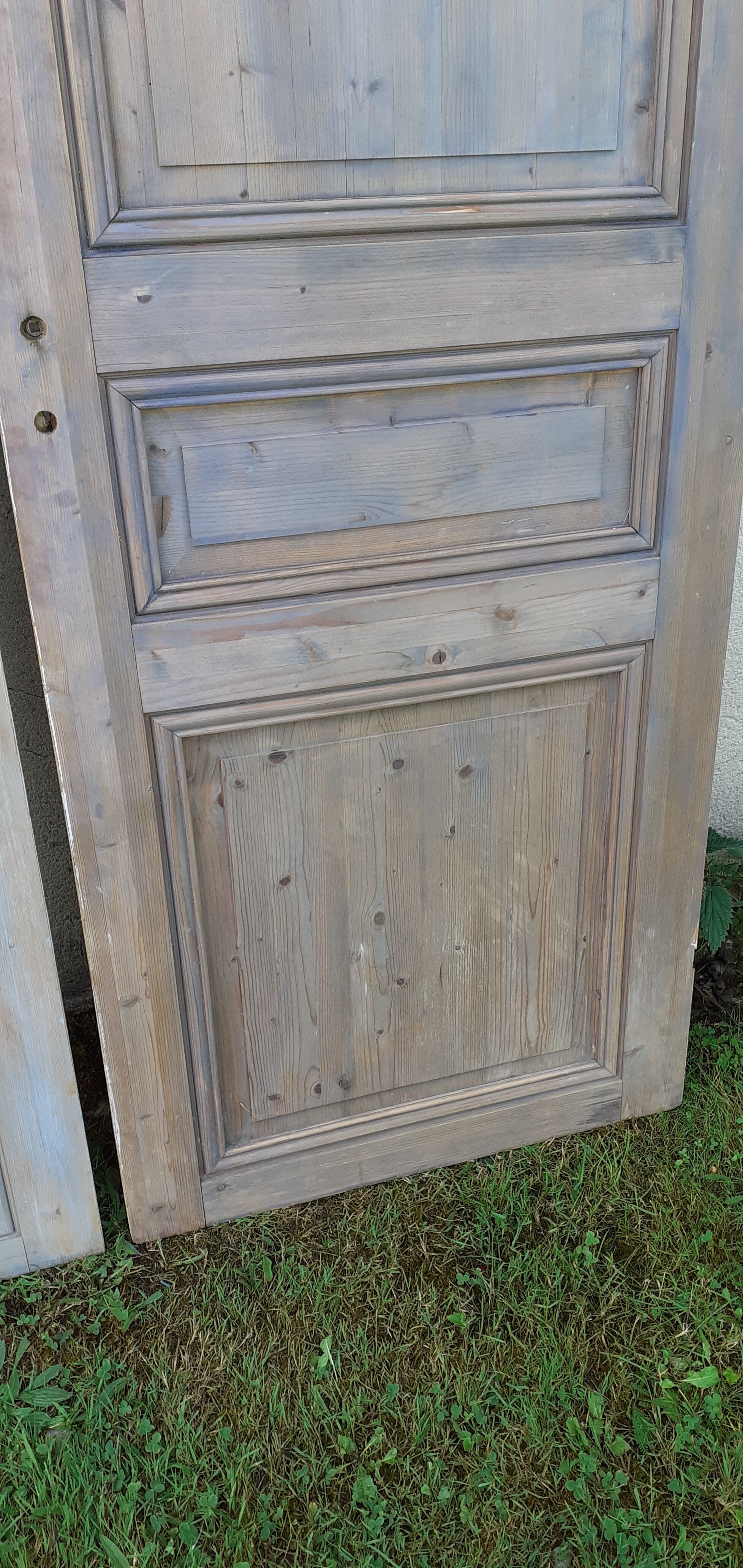 Pairs of Haussmannian doors in patinated aged wood