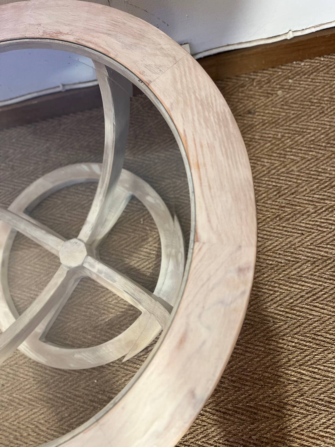 Oval patinated wood and beveled glass coffee table