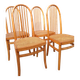 Set of 4 vintage Baumann chairs in honey wood and cane.