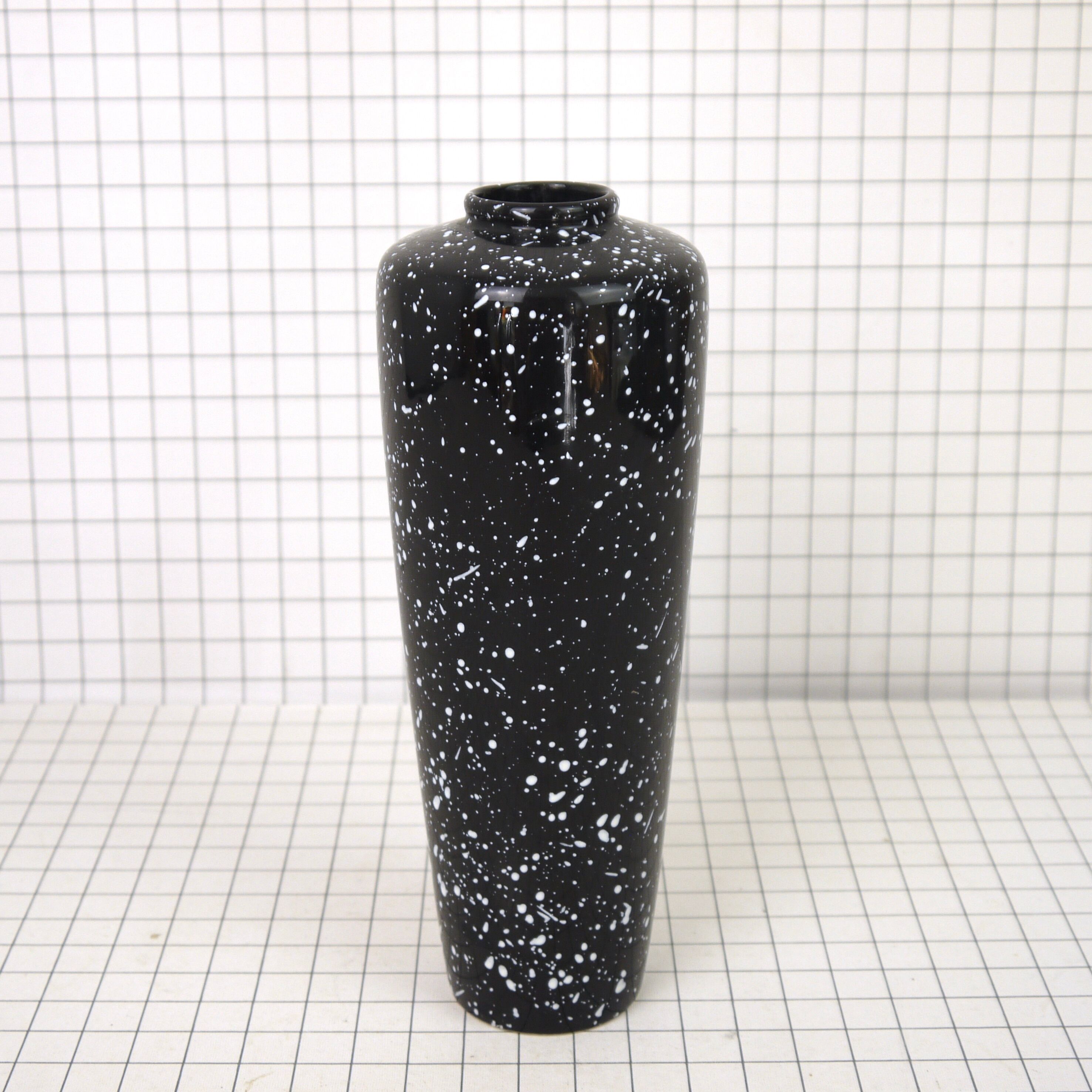Black and white speckled vase