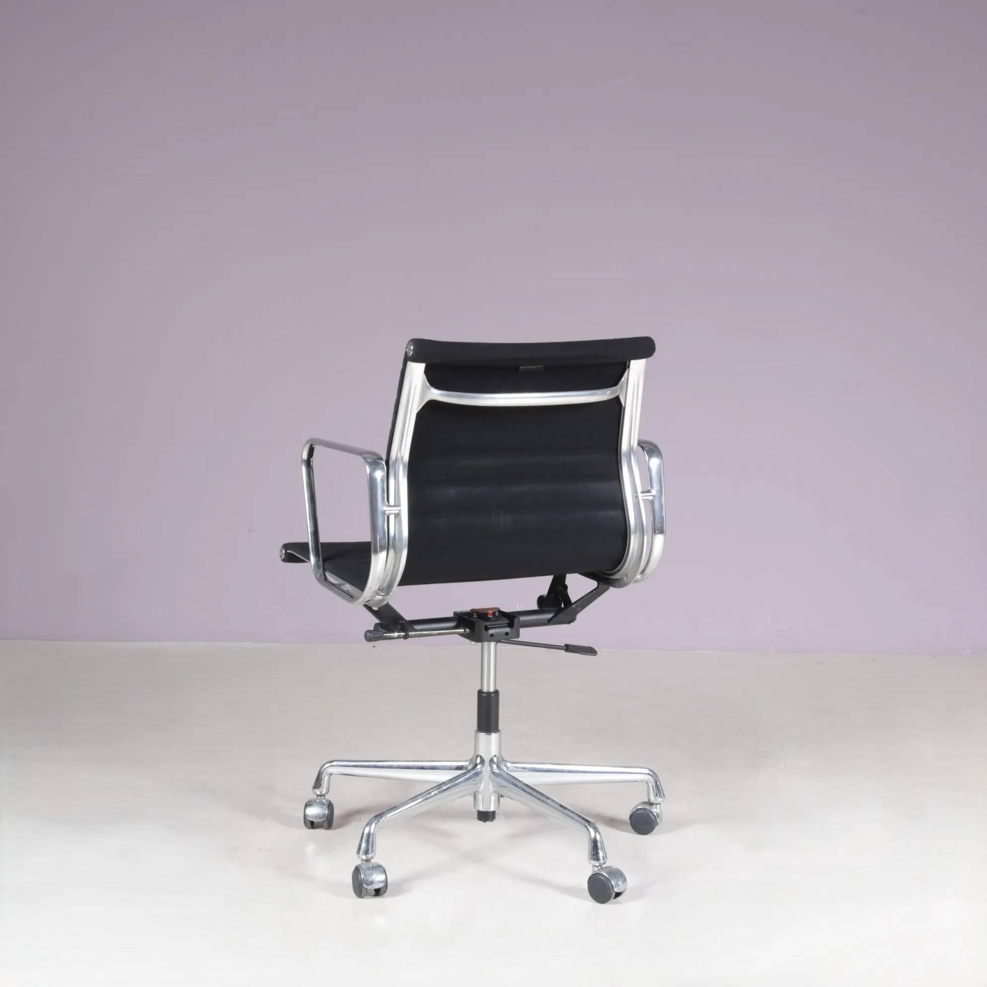 2000s desk chair model EA118, chrome base with black hopsack upholstery and aluminium armrests / Charles & Ray Eames / Vitra, Germany