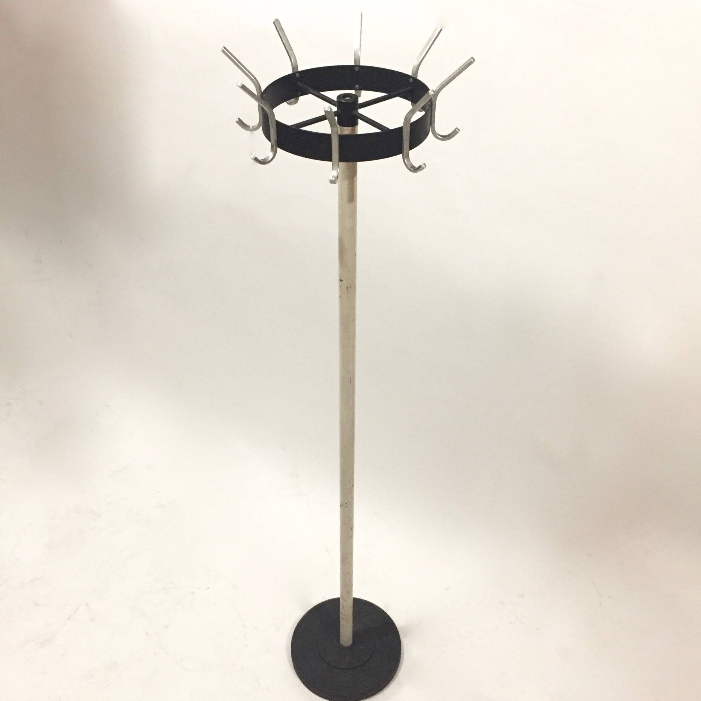 Coat rack on turnstile stand