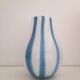 Beautiful white glass vase with blue stripes from the 80s.