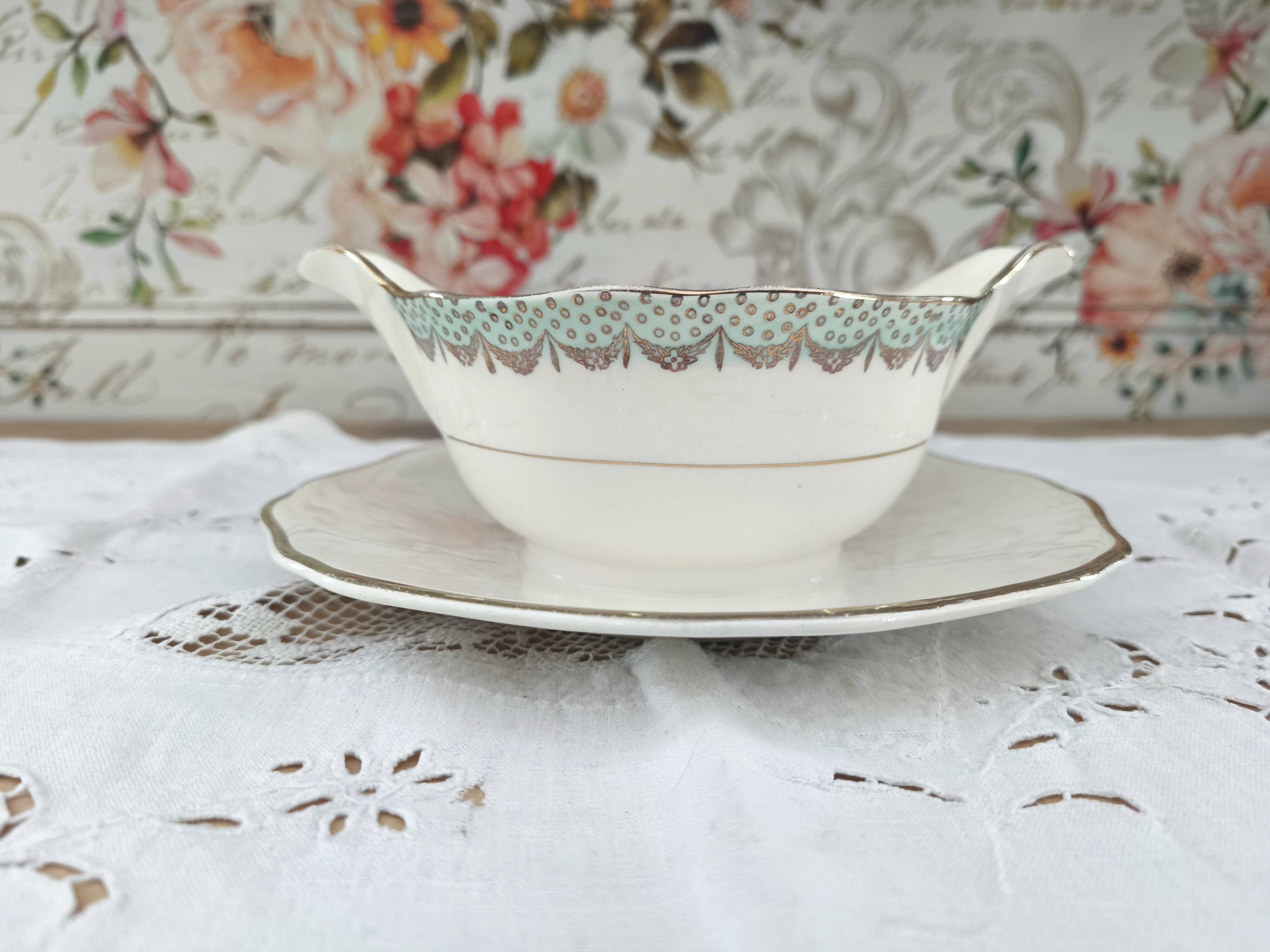 Round sauceboat on Longwy France earthenware frame, Trianon model